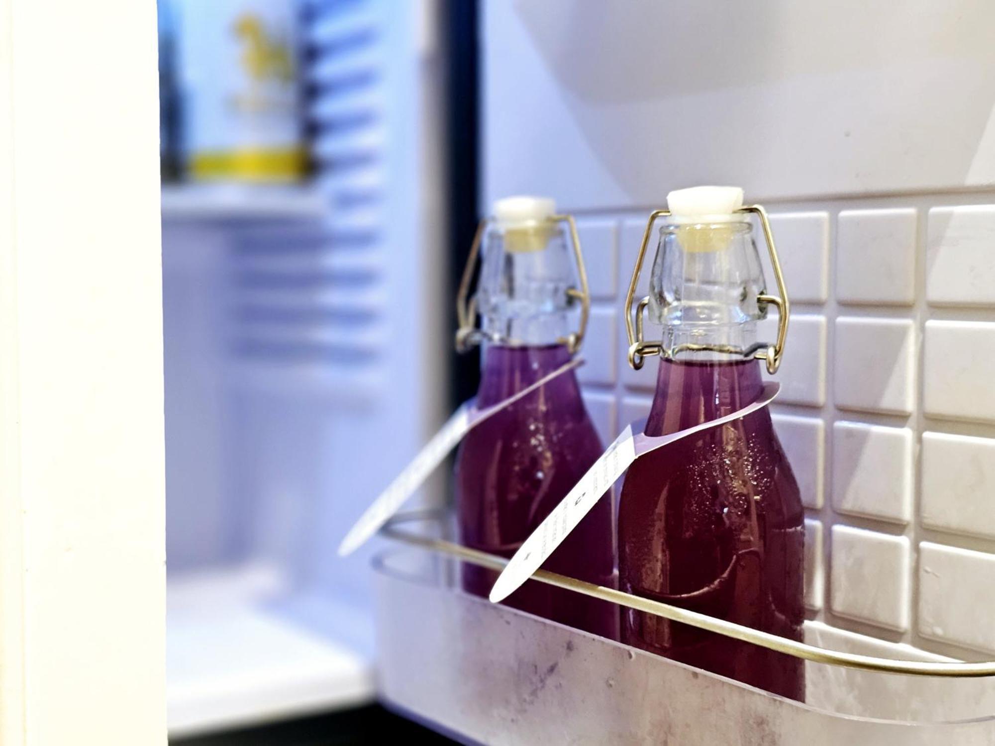 The Sukosol Hotel Bangkok Exteriér fotografie Bottles of blueberry juice